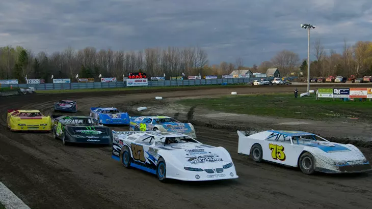 Cars racing around a track