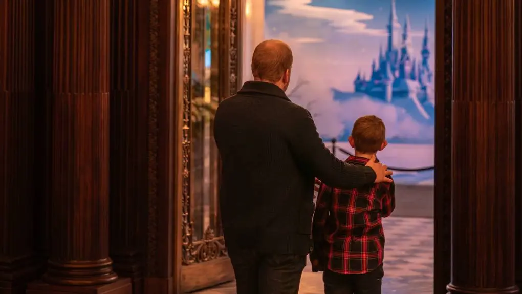 A father and young son view a fantasy exhibit in one of the grand rooms at Toronto's Casa Loma