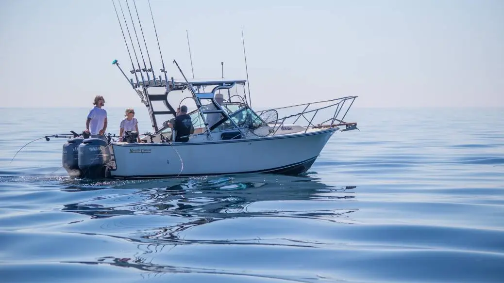 A group of anglers enjoys a summer day fishing on Lake Ontario with a local charter boat.