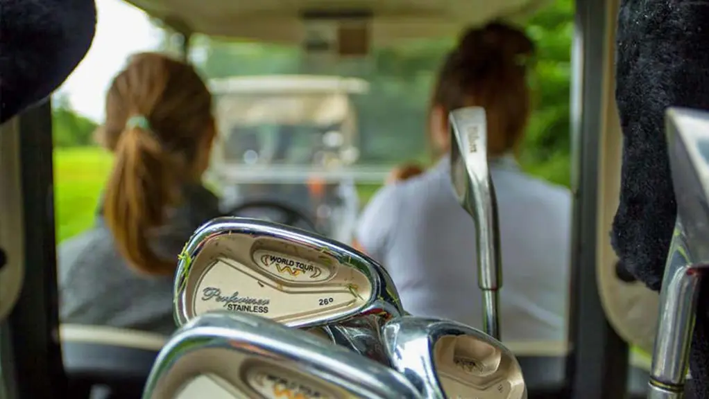 Two woman drive a golf cart across an Ontario golf course.