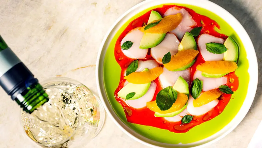 A colourful summer dish and drink being refilled at a popular Toronto restaurant.