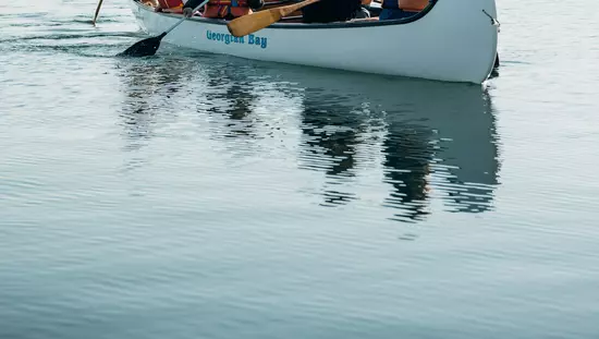 A group of people in a canoe
