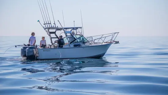 A group of anglers enjoys a summer day fishing on Lake Ontario with a local charter boat. 
