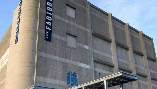 Side view of a re-purposed historic factory building.