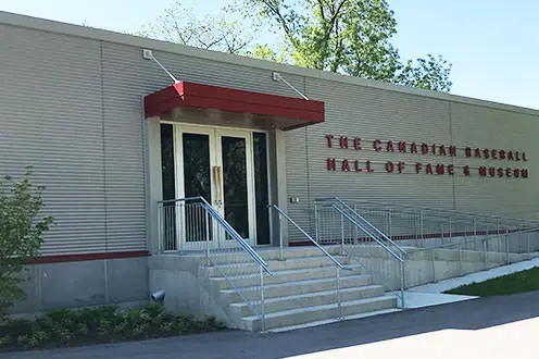The Canadian Baseball Hall of Fame and Museum, a simple grey building with red accents. 