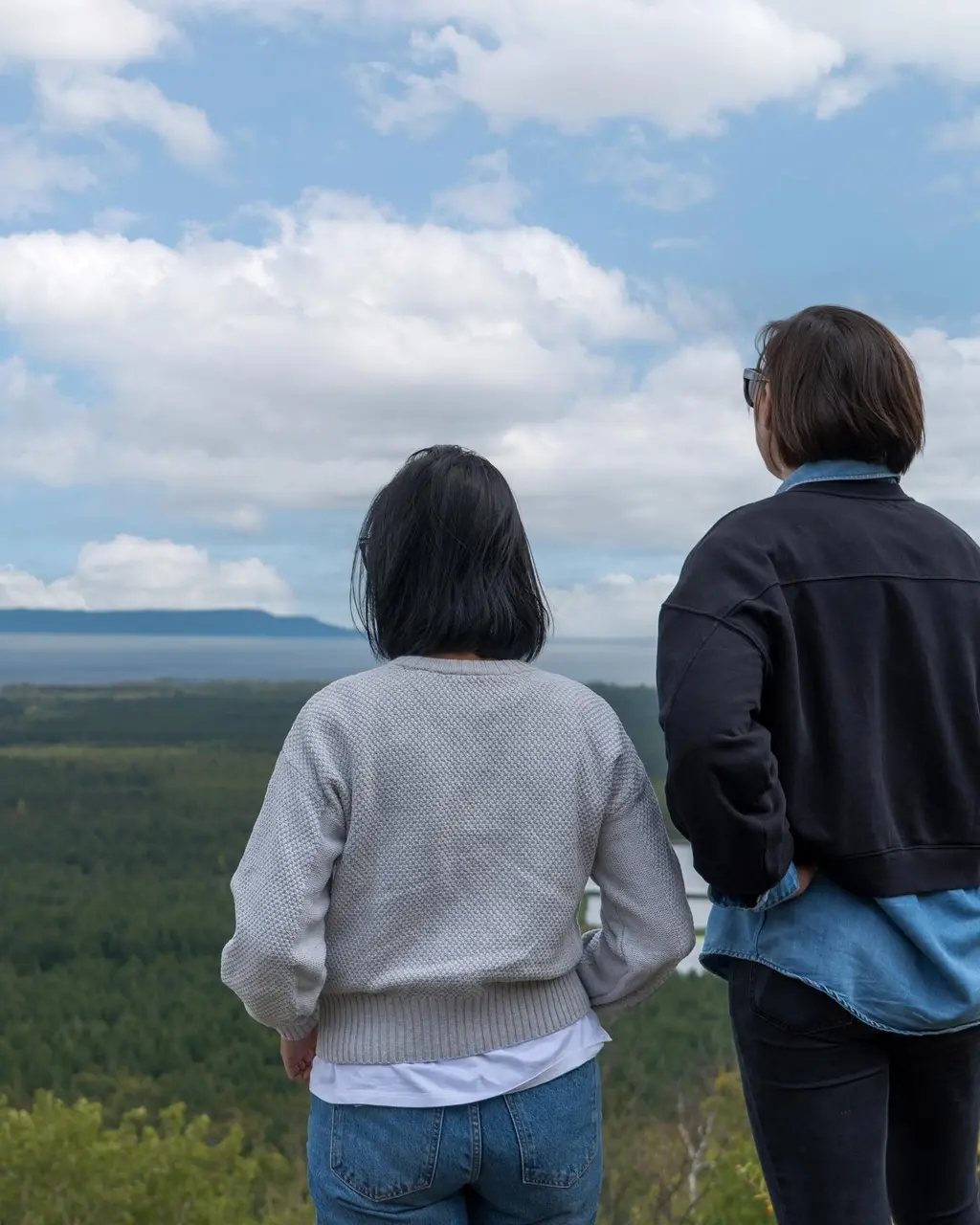 Two women watching the scenery from Mount McKay Lookout in Thunder Bay, Ontario.