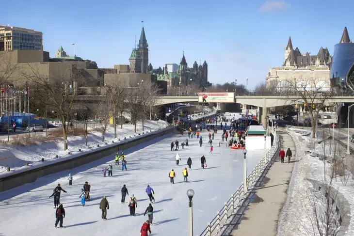 People skate along the Rideau Canal. 