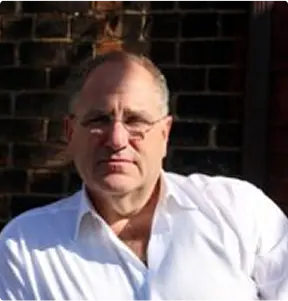 Headshot of Todd Halpern, wearing business attire with a composed expression.