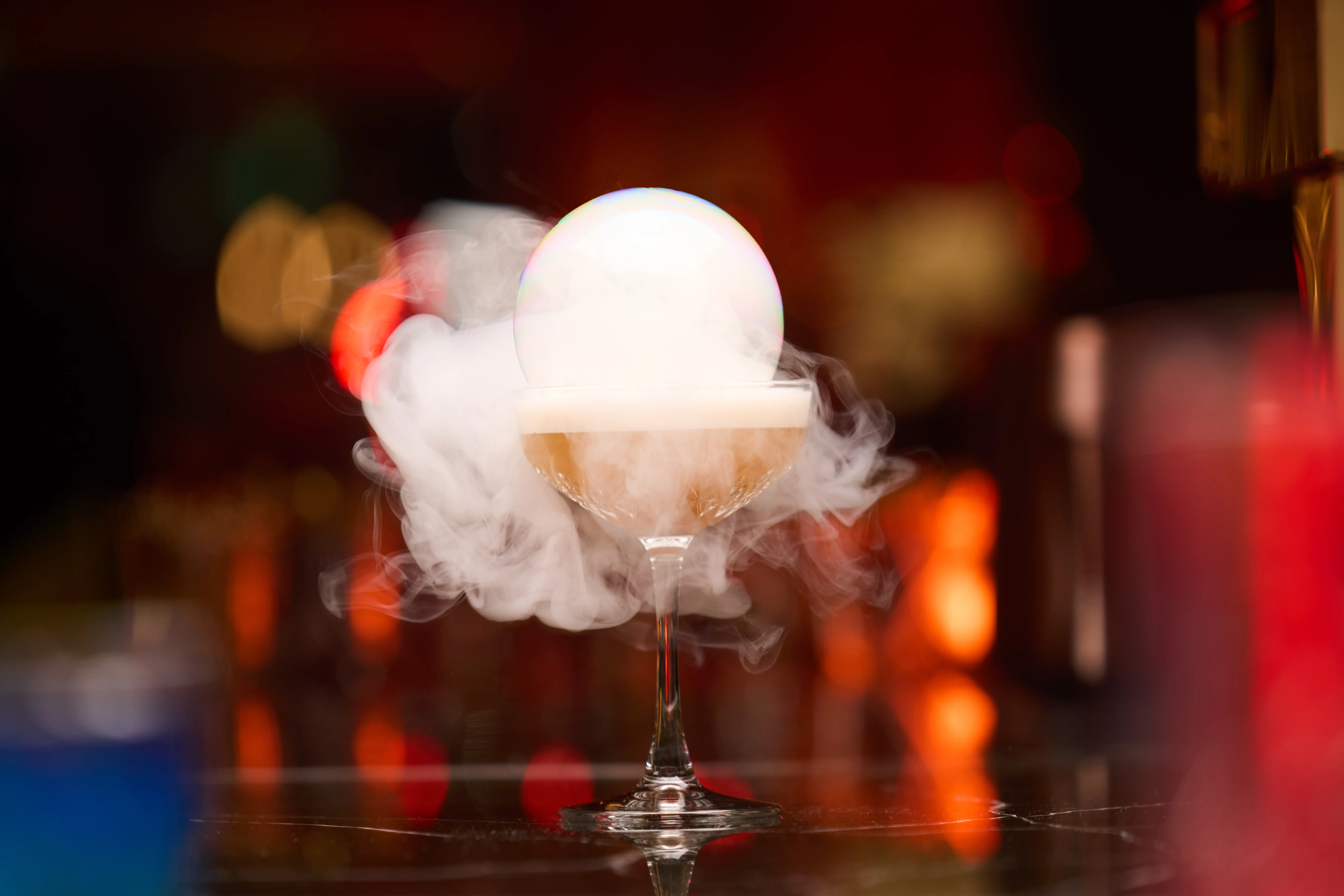 A smoky cocktail with a bubble garnish at 1913, a speakeasy-style bar in London, Ontario.