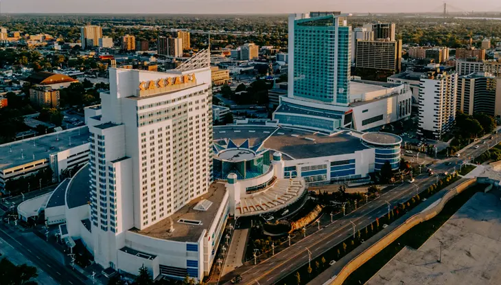 The Caesars Windsor hotel and casino high-rise building faces a main street in downtown Windsor.