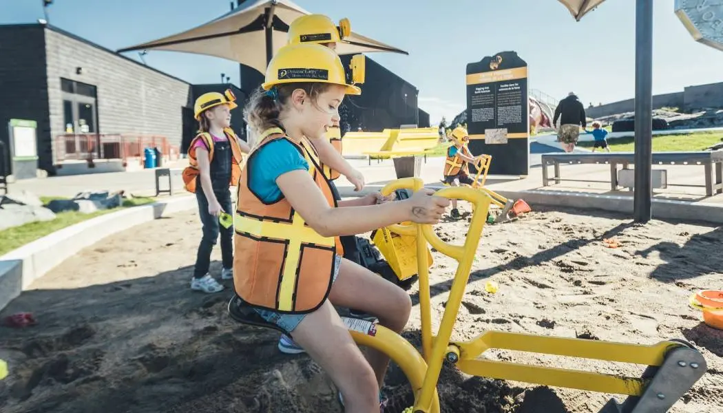 A young girl plays in a mining-themed playground at Dynamic Earth in Sudbury.