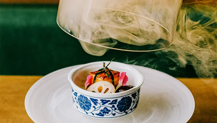 Dramatic presentation of a dish at a Kingston restaurant during the annual winter Kingstonlicious event.