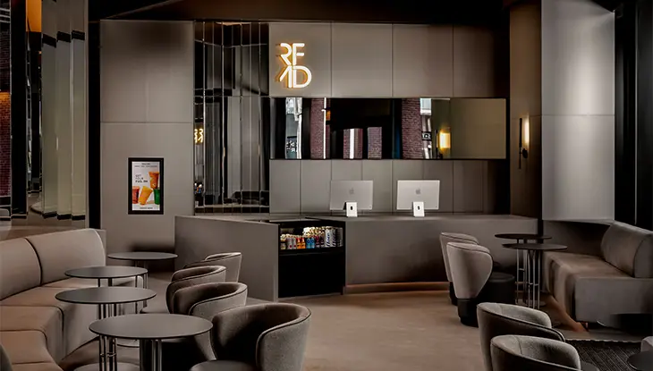 Reception area of a fitness and wellness centre offering training spaces, recovery services and wellness programs.